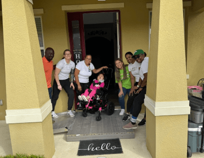 Family and friends gathered outside home